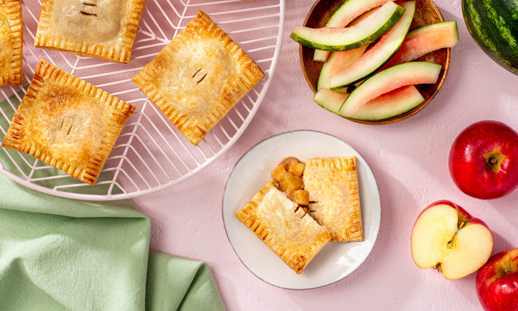 watermelon rind and apple hand pies on a platter and plate