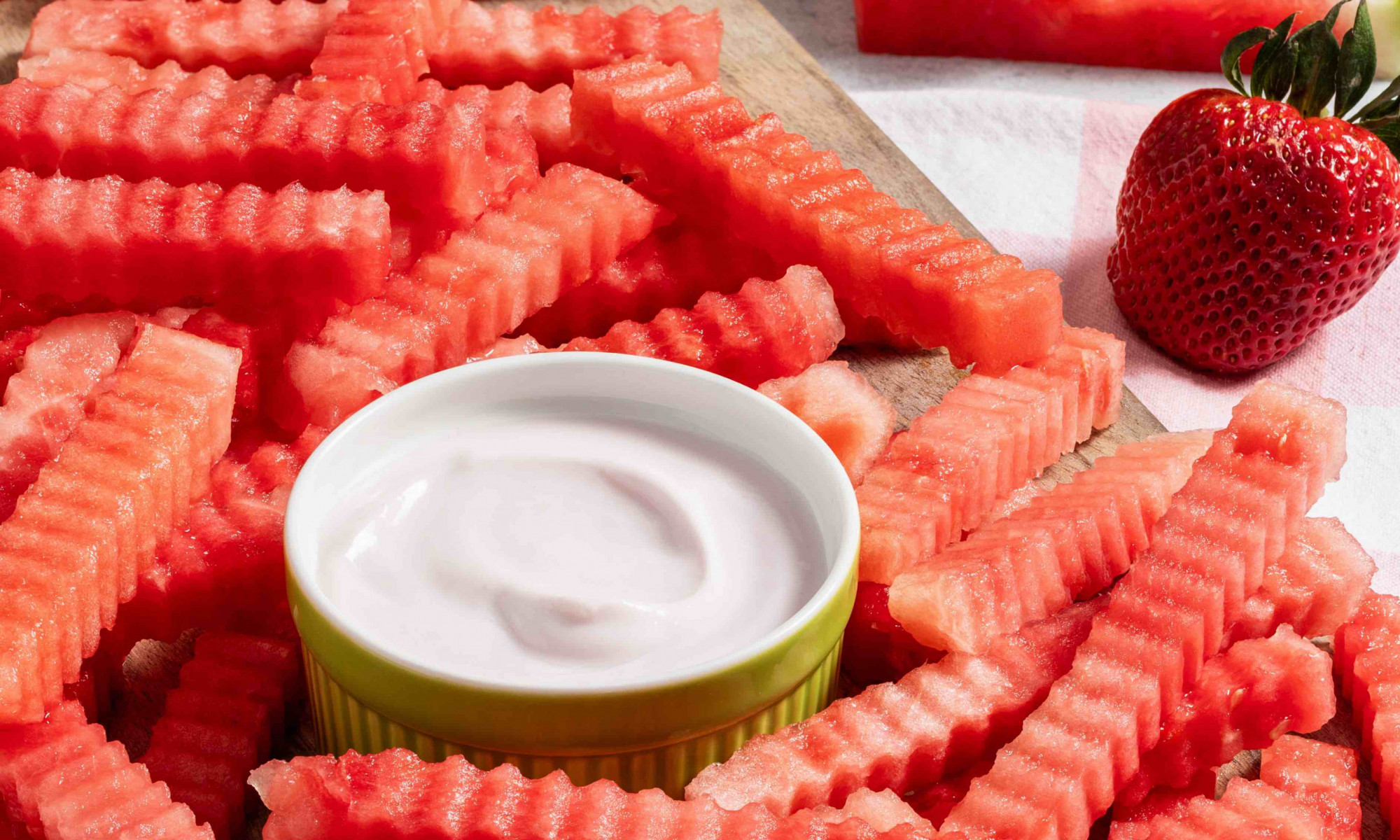 Watermelon cut into crinkle cut "fries" with dipping sauce