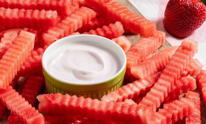 Watermelon cut into crinkle cut "fries" with dipping sauce