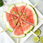 Margarita Watermelon wedges with popsicle sticks topped with salt and lime